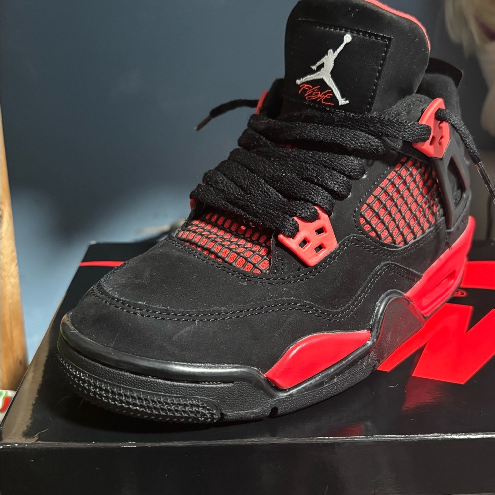 Black and Red Air Jordan 1 sneakers